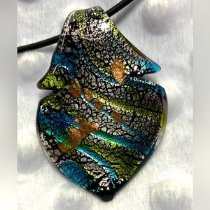 Glass pendant on black cord